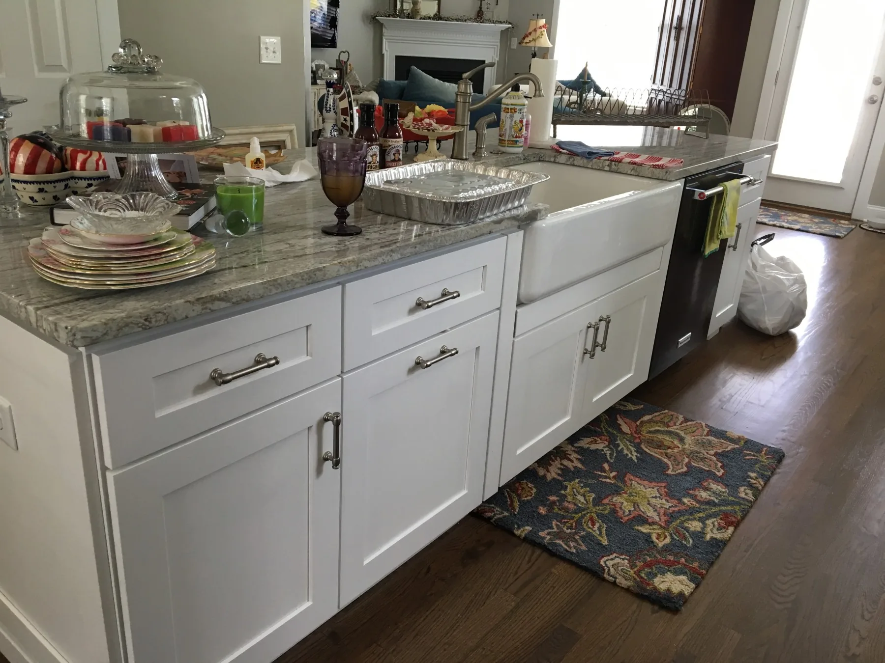 White kitchen island with farmhouse sink